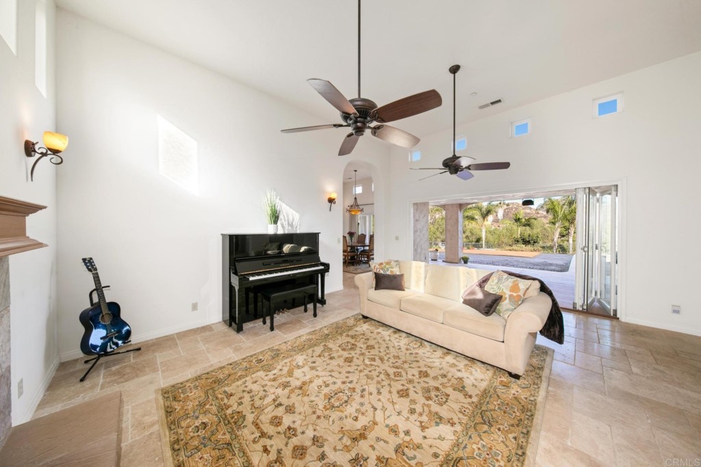 15460 Markar Road Poway, CA 92064 - Photo 11 of 36 a living room with furniture and a flat screen tv