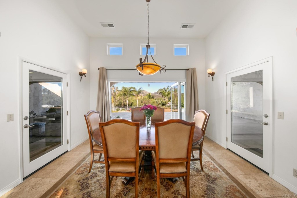 15460 Markar Road Poway, CA 92064 - Photo 13 of 36 a dining room filled with furniture and a window