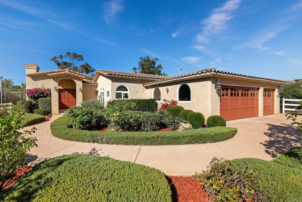 15460 Markar Road Poway, CA 92064 - Photo 2 of 36 a front view of a house with a yard