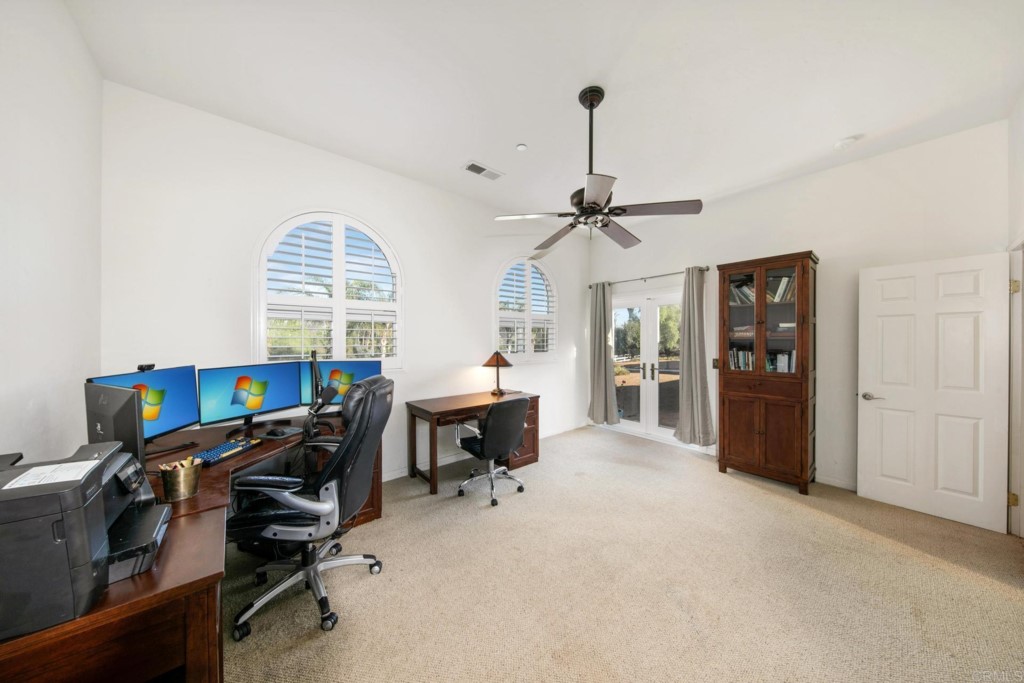 15460 Markar Road Poway, CA 92064 - Photo 25 of 36 a view of a workspace with furniture and a window