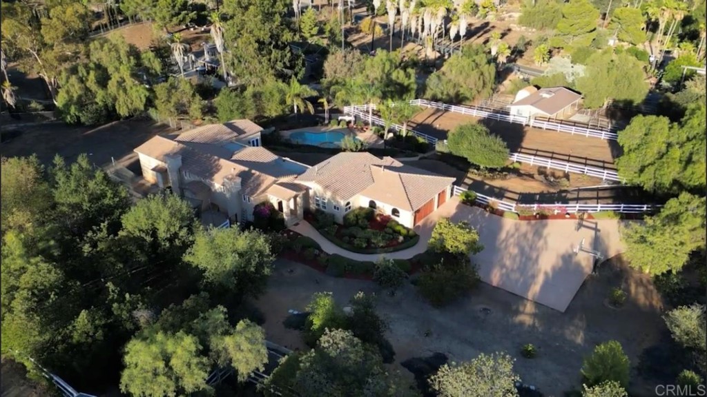 15460 Markar Road Poway, CA 92064 - Photo 3 of 36 an aerial view of a house with a yard and lake view