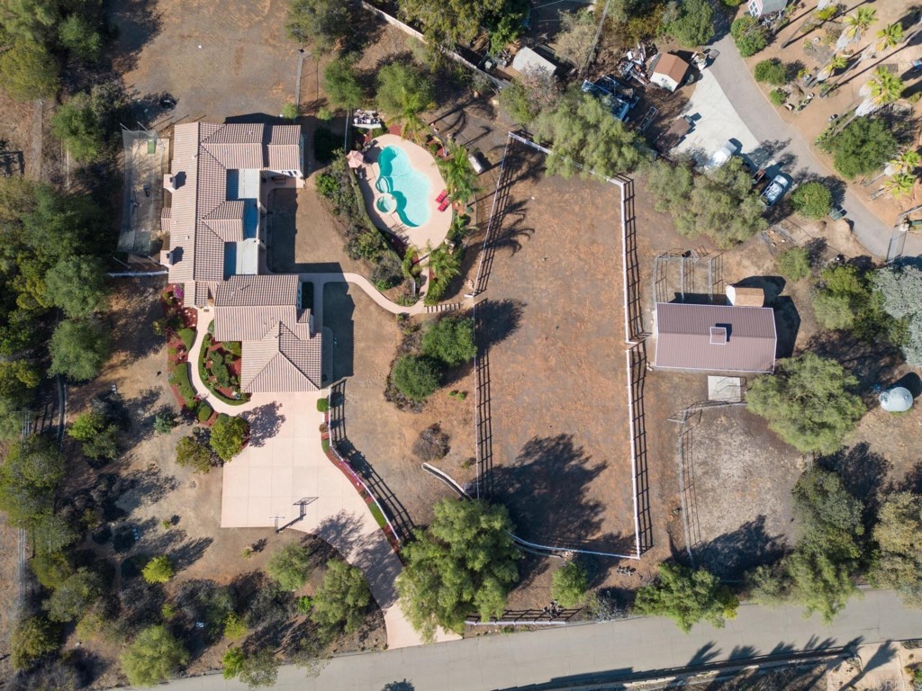 15460 Markar Road Poway, CA 92064 - Photo 34 of 36 an aerial view of a house with a yard and large trees