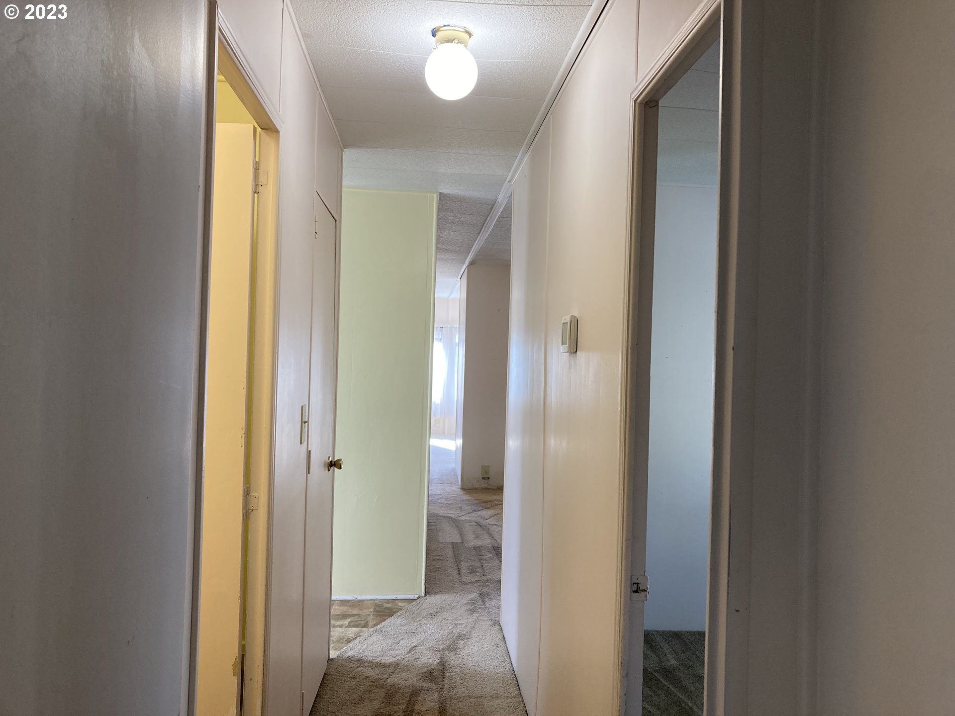 205 South 54th Street, Unit 7 Springfield, OR 97478 - Photo 16 of 32 a view of a bathroom from a hallway