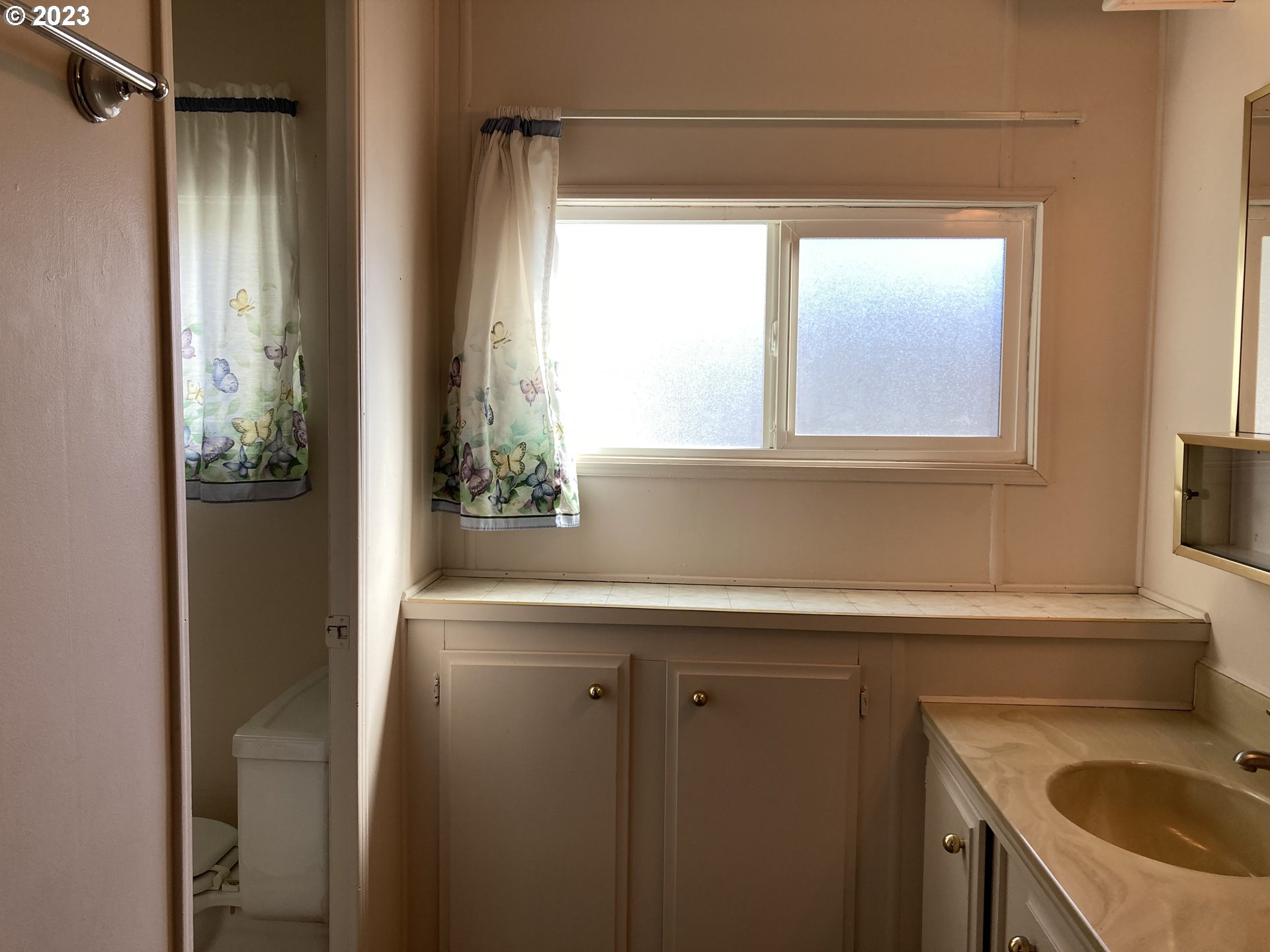 205 South 54th Street, Unit 7 Springfield, OR 97478 - Photo 18 of 32 a view of a sink and a window