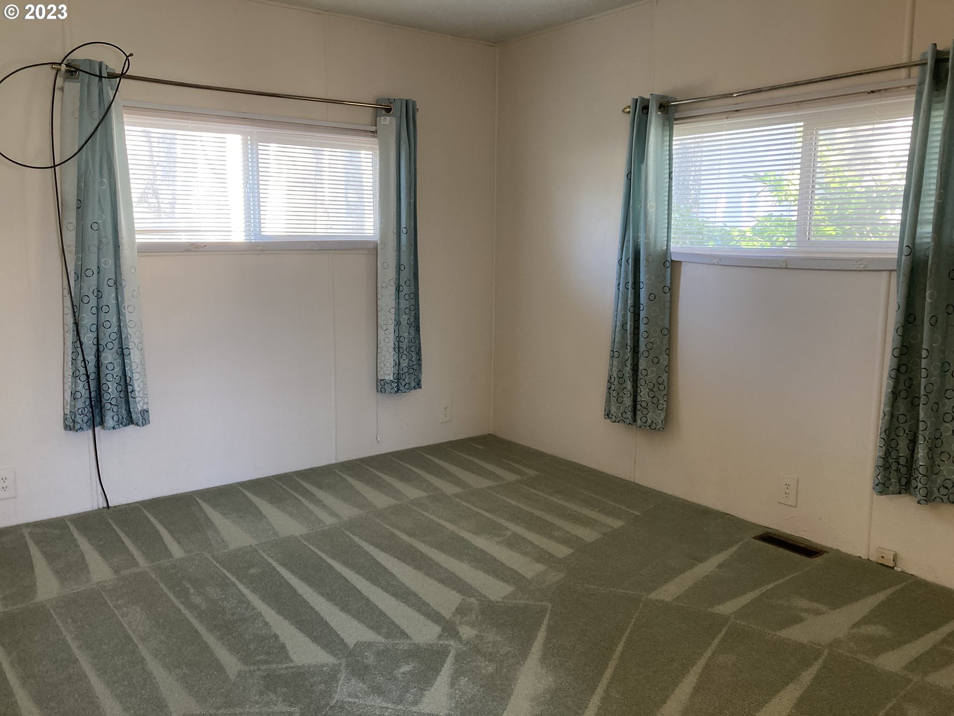 205 South 54th Street, Unit 7 Springfield, OR 97478 - Photo 21 of 32 a view of an empty room with a window