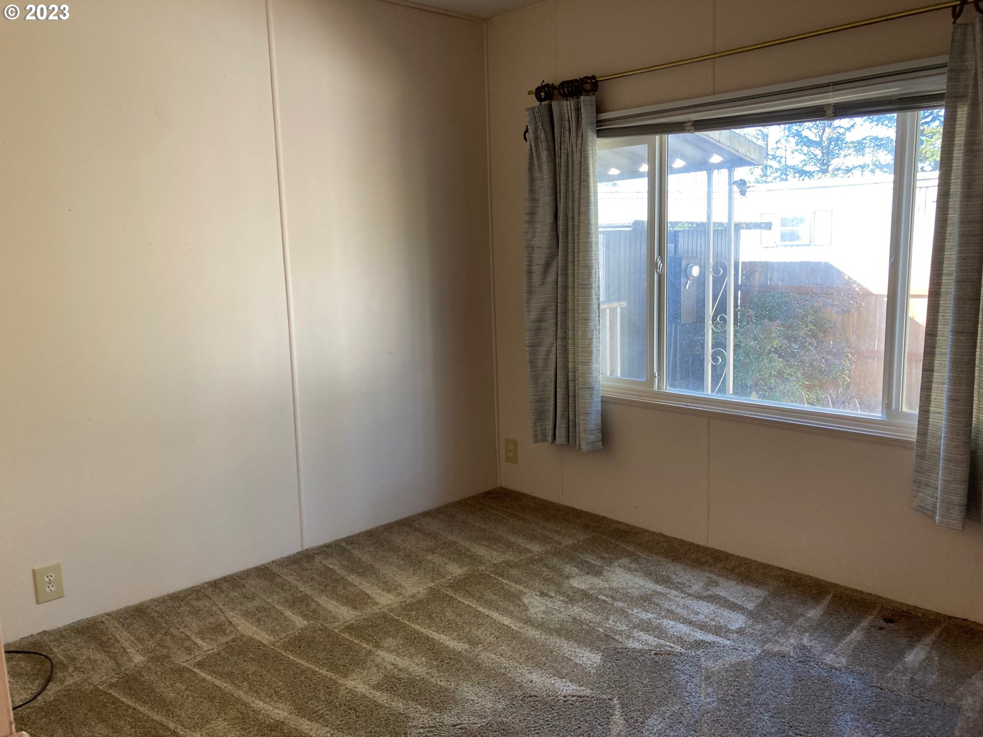 205 South 54th Street, Unit 7 Springfield, OR 97478 - Photo 25 of 32 a view of empty room with window
