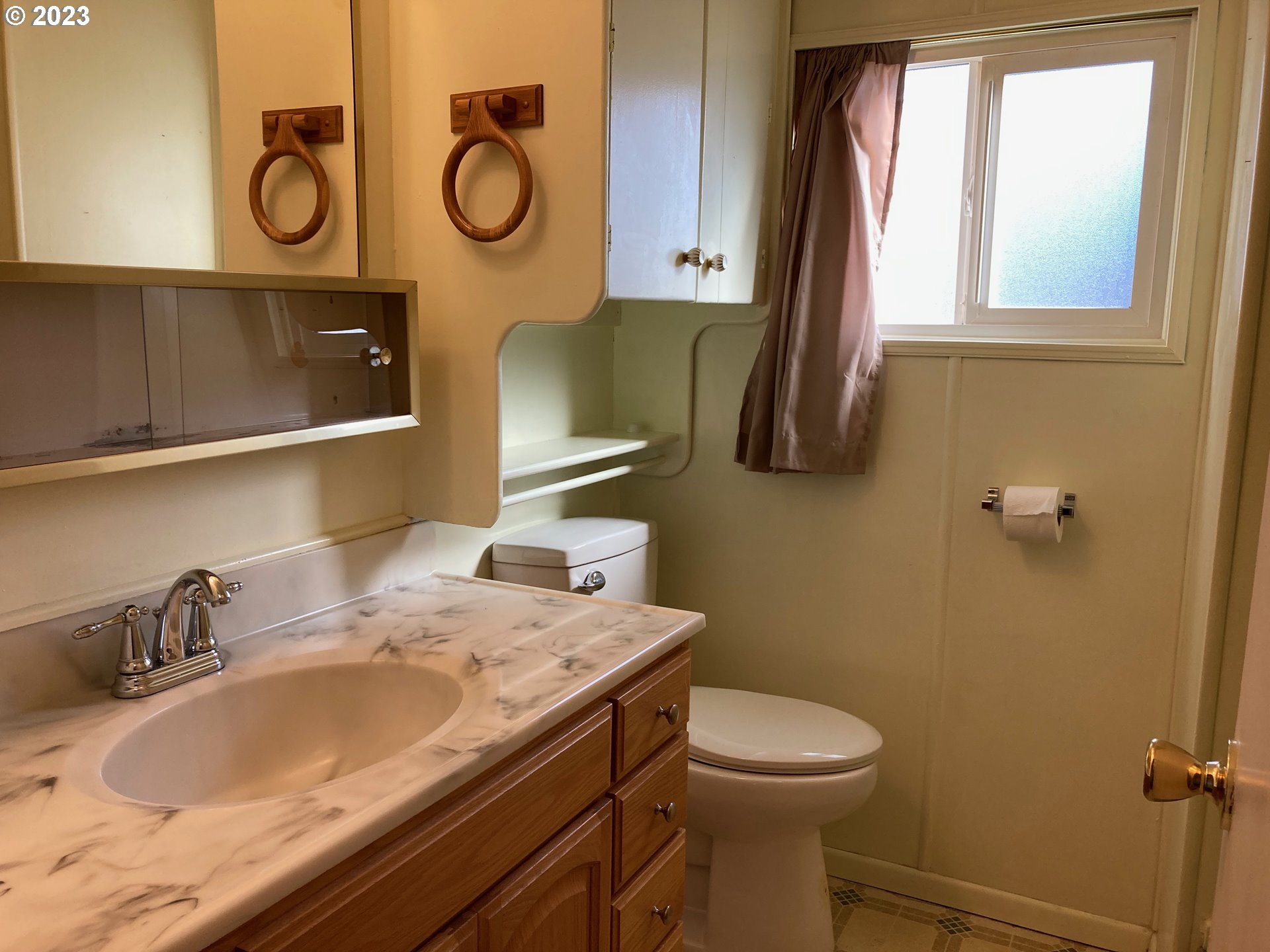 205 South 54th Street, Unit 7 Springfield, OR 97478 - Photo 27 of 32 a bathroom with a sink and a toilet