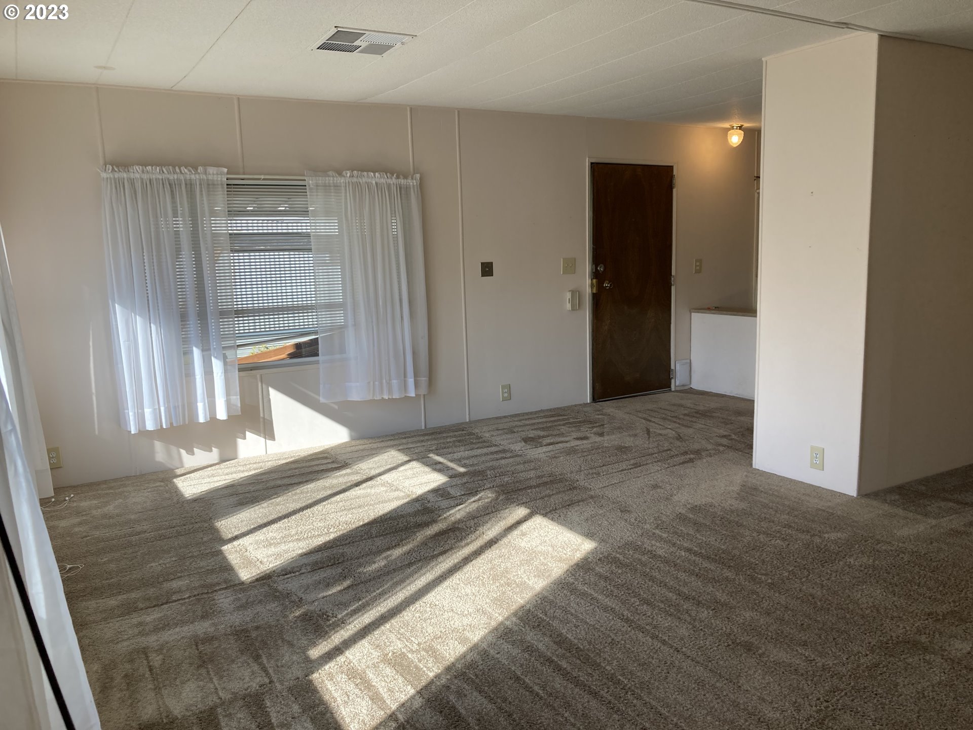 205 South 54th Street, Unit 7 Springfield, OR 97478 - Photo 9 of 32 a view of a bedroom with wooden floor and cabinet