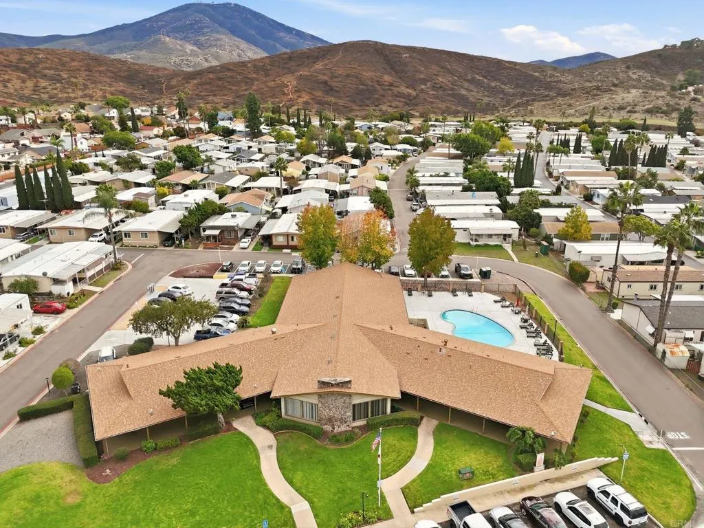 10767 Jamacha Spring Valley, Unit SPC 119 Spring Valley, CA 91978 - Photo 24 of 25 an aerial view of residential houses with outdoor space