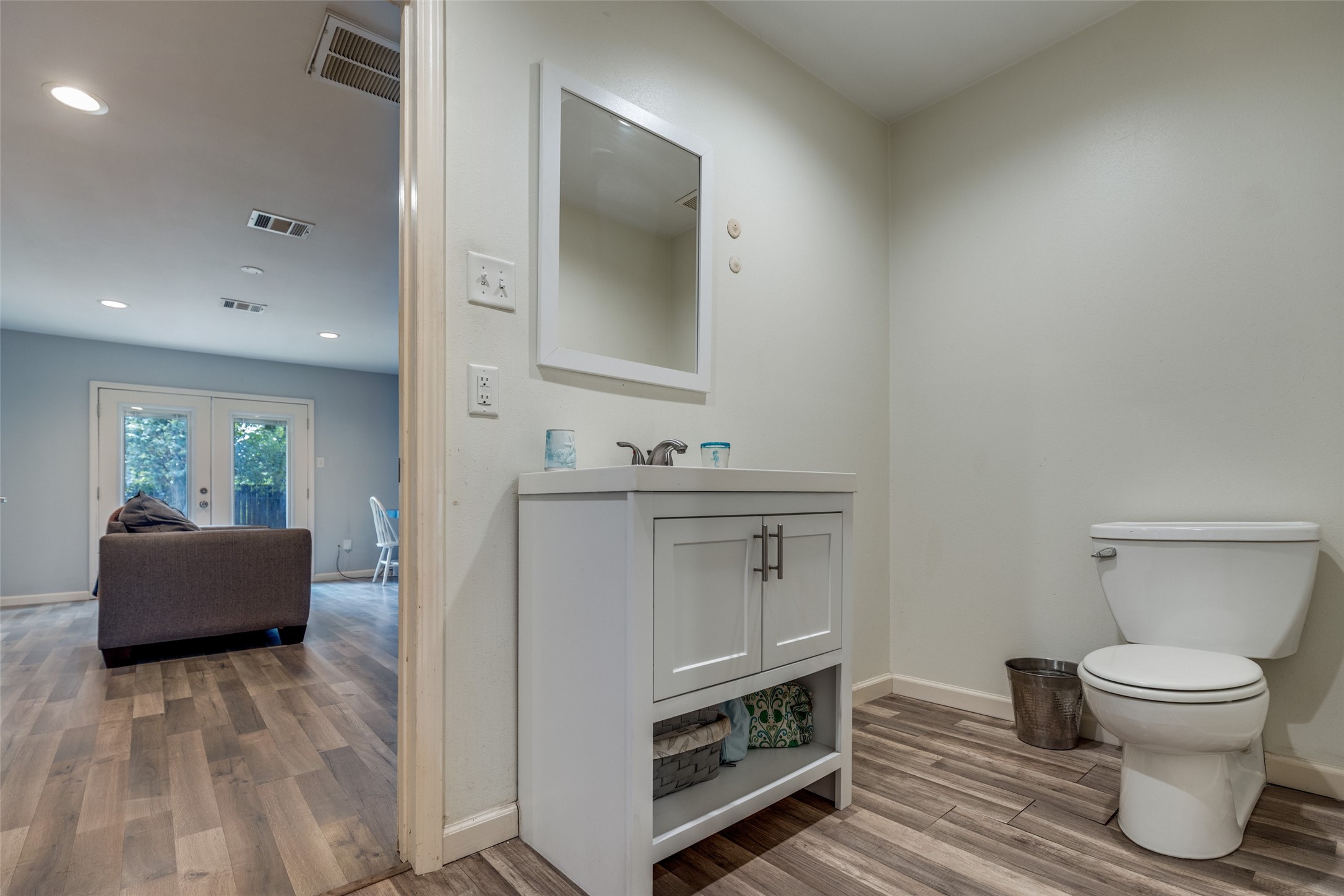 2007 Hewitt Drive Houston, TX 77018 - Photo 12 of 25 a bathroom with a toilet sink and mirror