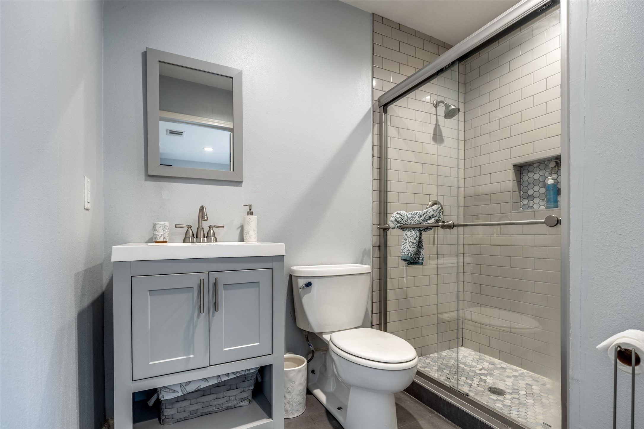 2007 Hewitt Drive Houston, TX 77018 - Photo 13 of 25 a bathroom with a toilet sink and shower