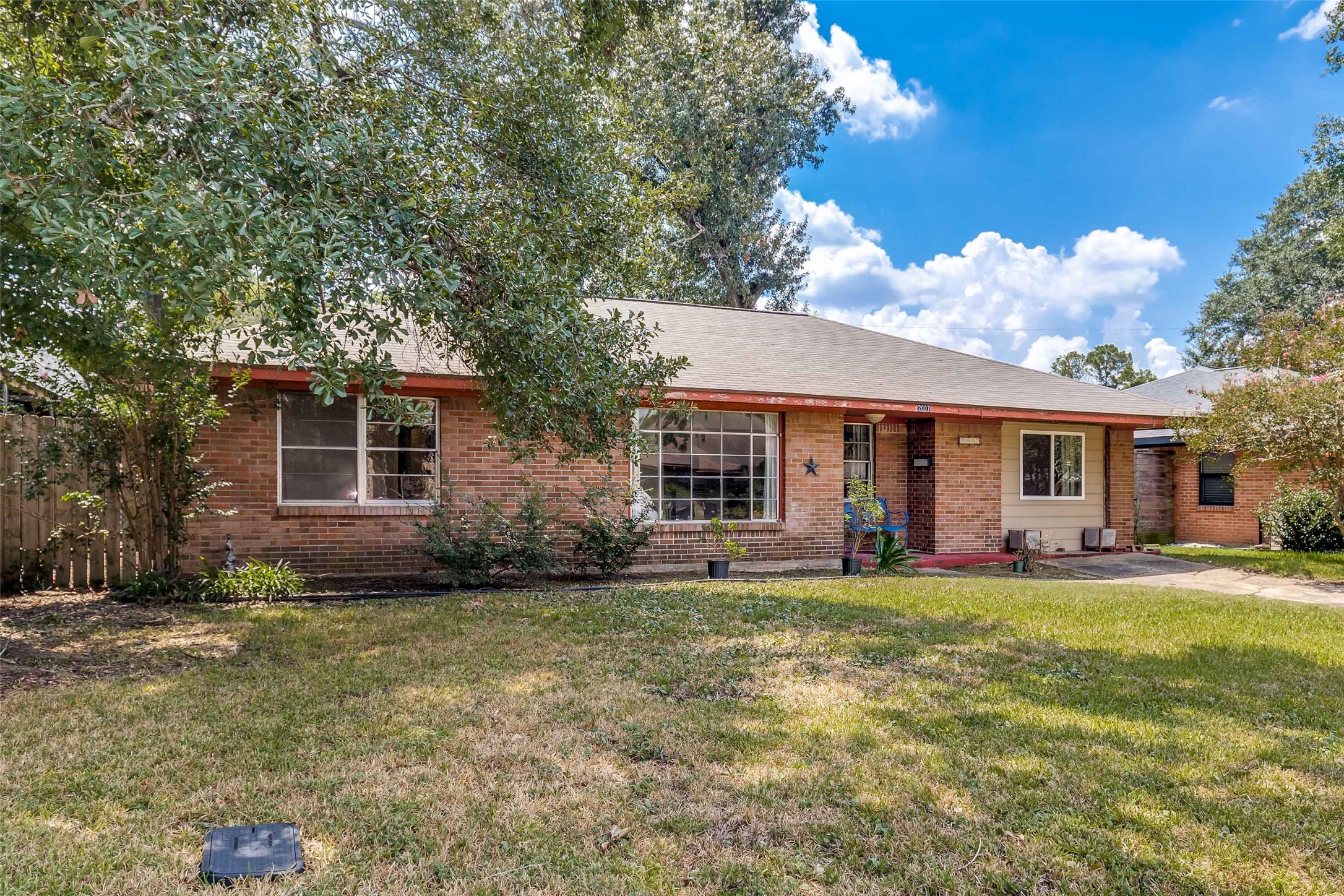 2007 Hewitt Drive Houston, TX 77018 - Photo 20 of 25 a view of a house with a yard