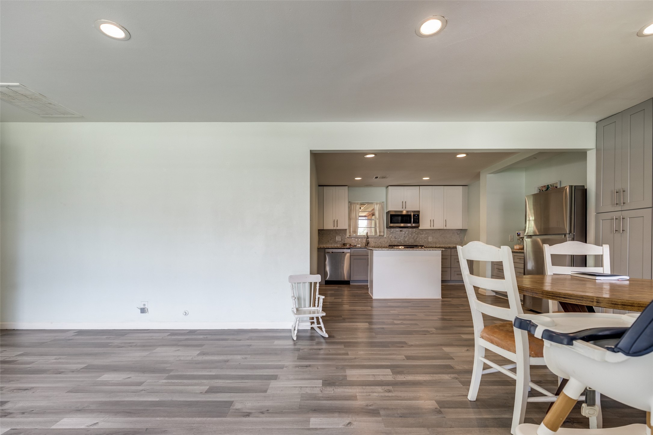 2007 Hewitt Drive Houston, TX 77018 - Photo 5 of 25 a view of kitchen with stainless steel appliances refrigerator oven and stove