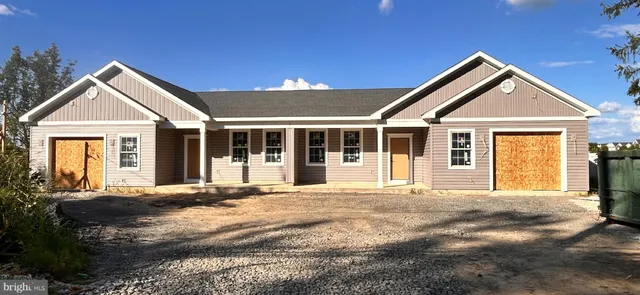 a house with trees in the background