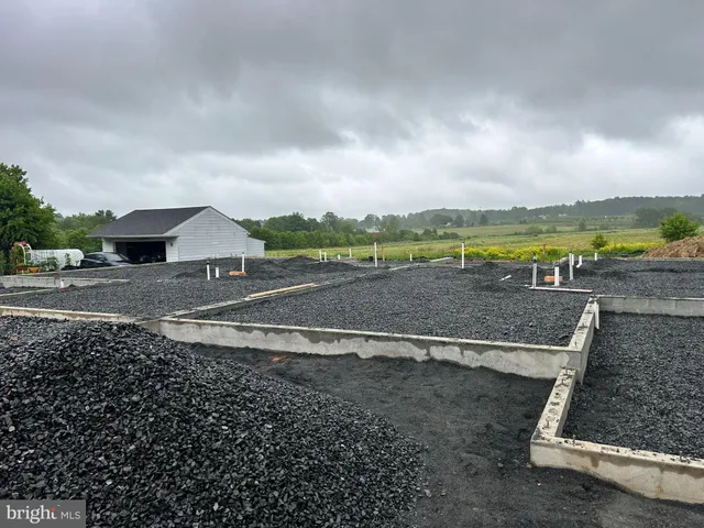a view of an empty room with a balcony