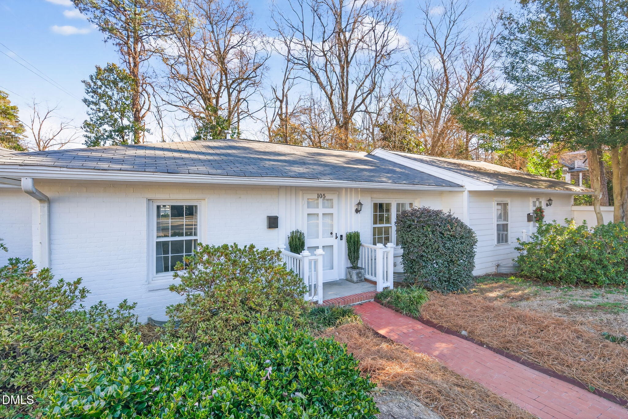 1901 Clark Avenue, Unit 105 Raleigh, NC 27605 - Photo 1 of 28 a front view of a house with garden