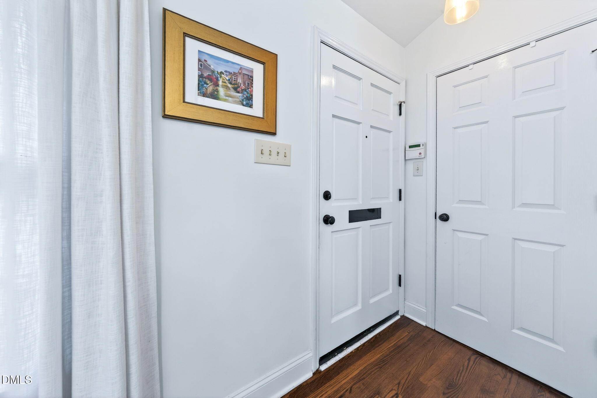 1901 Clark Avenue, Unit 105 Raleigh, NC 27605 - Photo 4 of 28 a view of a hallway with wooden floor