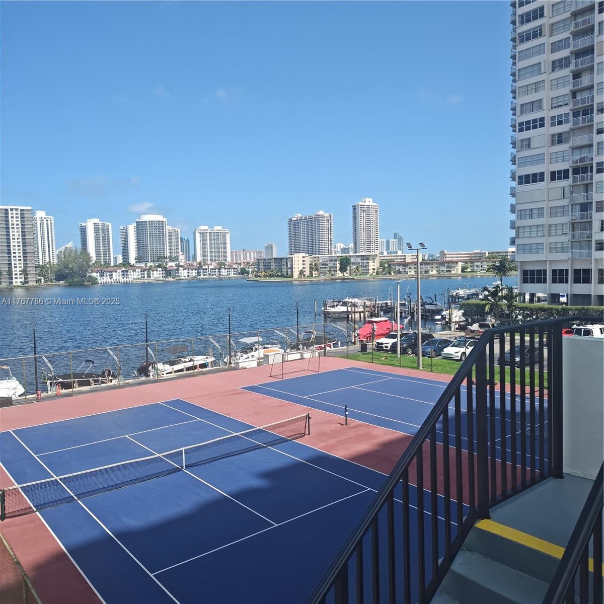 2750 Northeast 183rd Street, Unit 301 Aventura, FL 33160 - Photo 21 of 38 a view of a tennis court