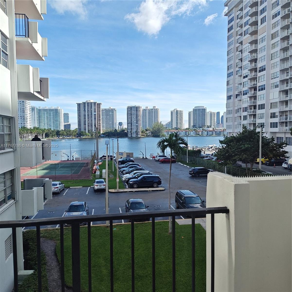 2750 Northeast 183rd Street, Unit 301 Aventura, FL 33160 - Photo 10 of 38 a view of a city from a balcony