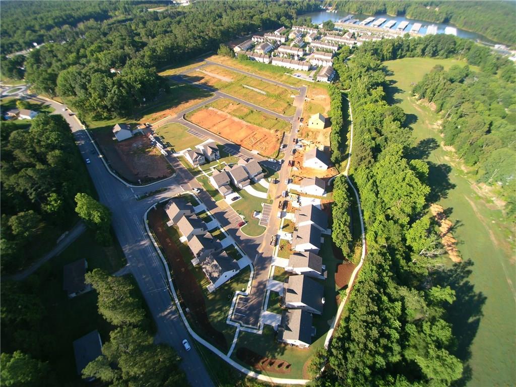 5934 Watersdown Way Flowery Branch, GA 30542 - Photo 20 of 28 an aerial view of a residential houses