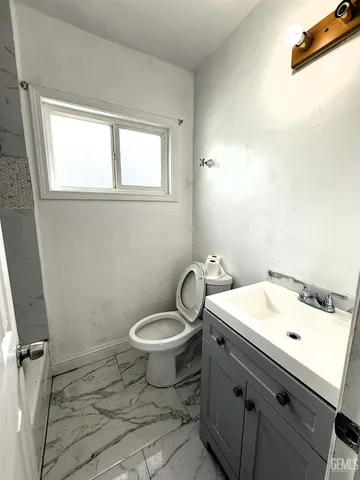 a bathroom with a sink and a toilet