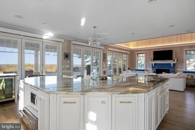 a kitchen with stainless steel appliances granite countertop a sink and cabinets