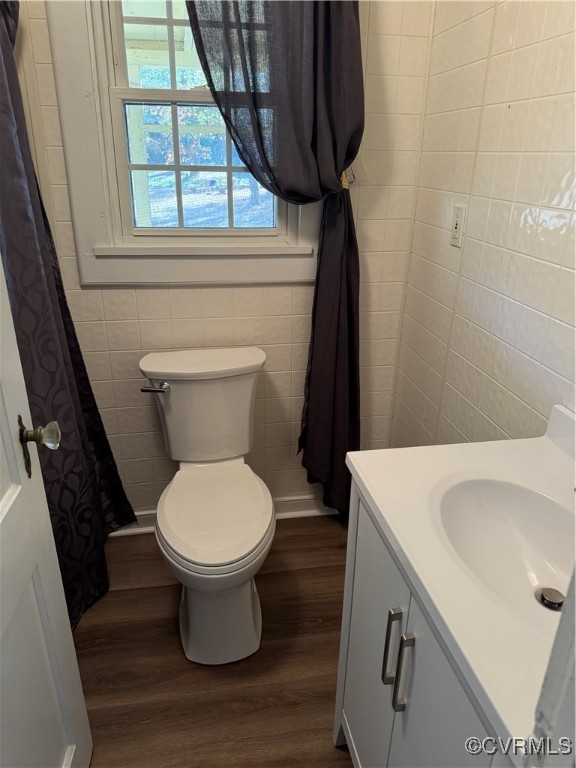 14807 Spruce Avenue Chester, VA 23836 - Photo 13 of 20 Bathroom featuring toilet, tile walls, curtained s
