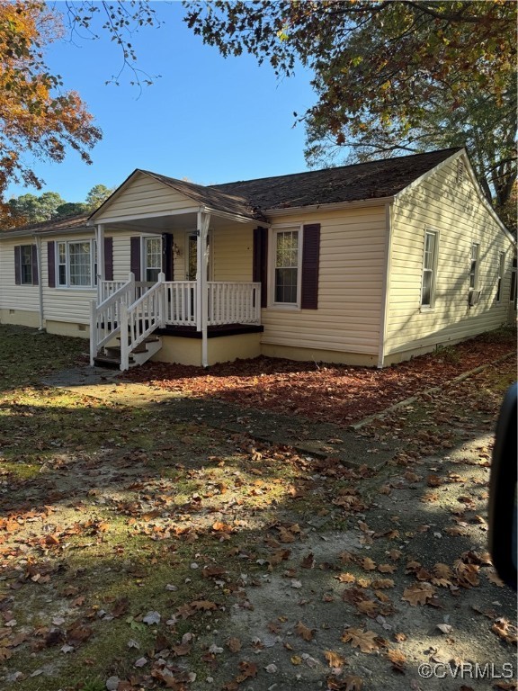 14807 Spruce Avenue Chester, VA 23836 - Photo 19 of 20 View of front facade featuring covered porch