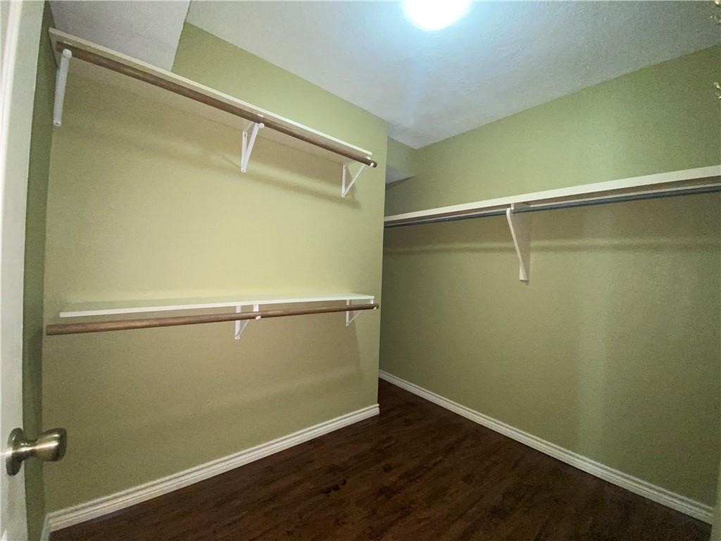 310 Sunset Boulevard Portland, TX 78374 - Photo 8 of 18 a view of a room with wooden floor