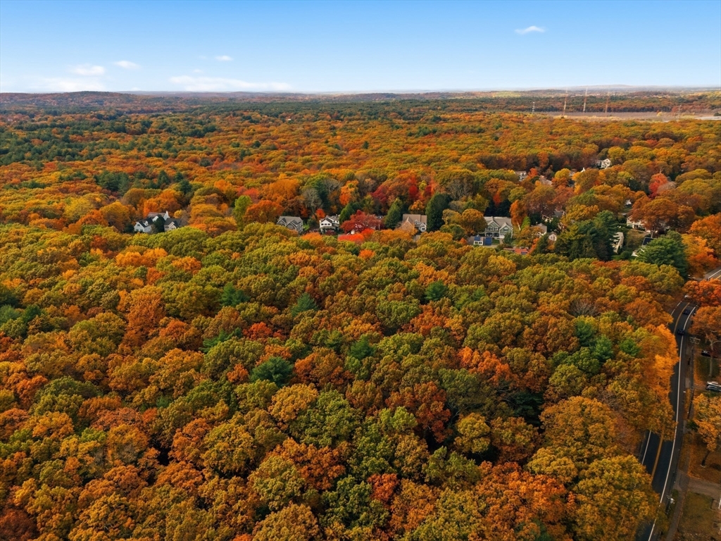 an aerial view of residential building with parking space