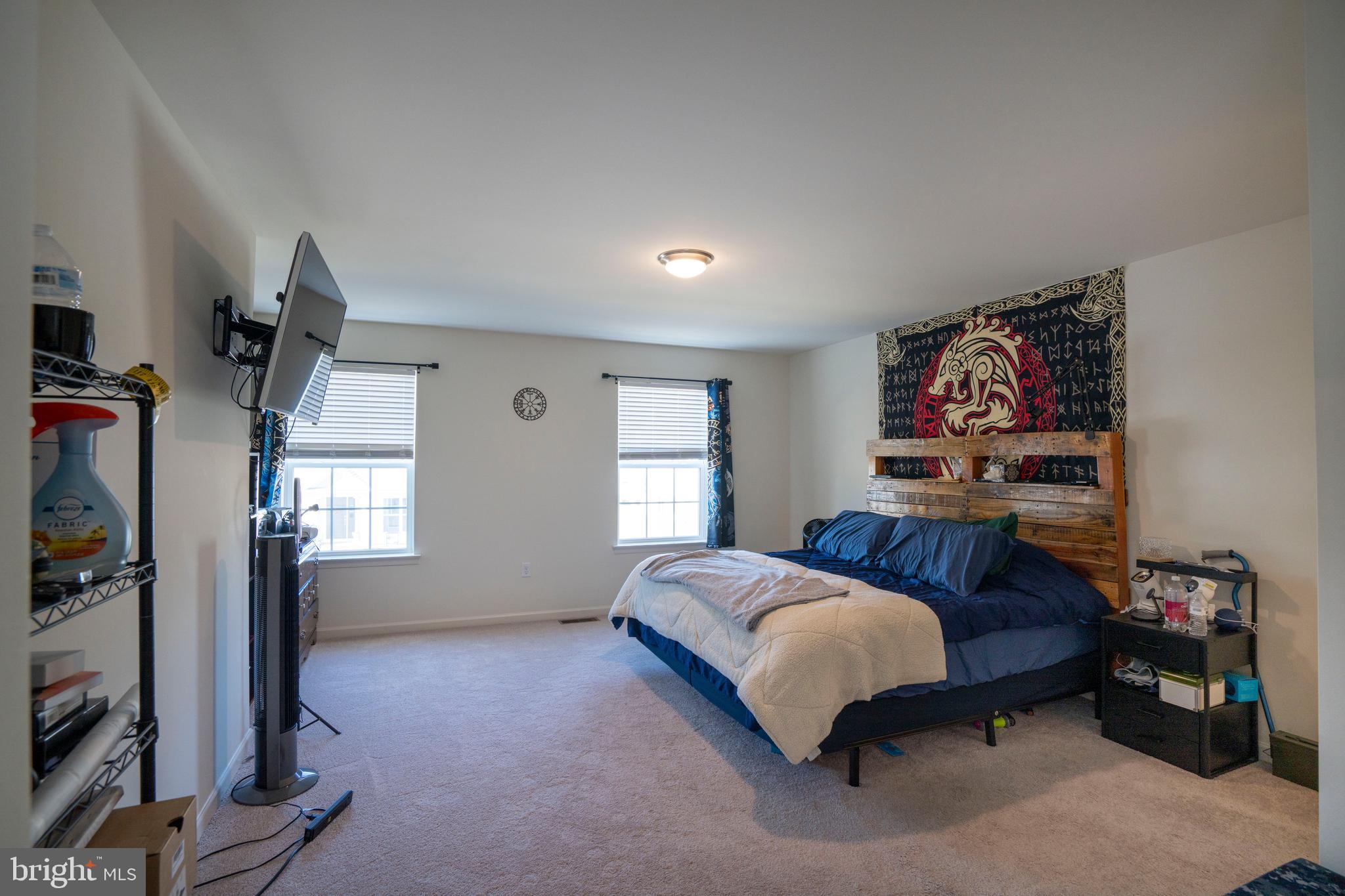273 Fawn Valley Road State College, PA 16803 - Photo 22 of 47 a bedroom with a bed and a flat screen tv