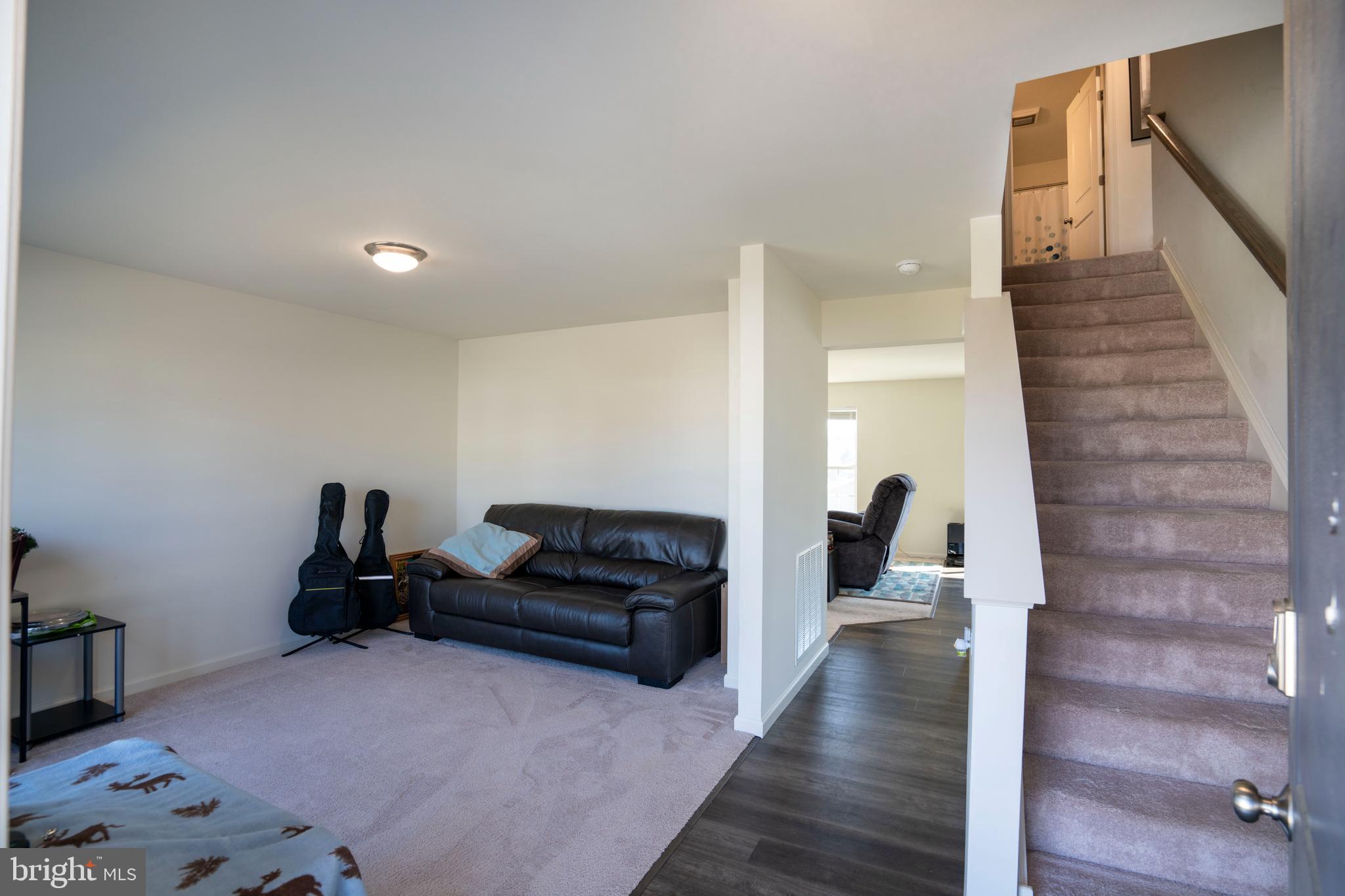 273 Fawn Valley Road State College, PA 16803 - Photo 4 of 47 a living room with furniture and a hard wood floor
