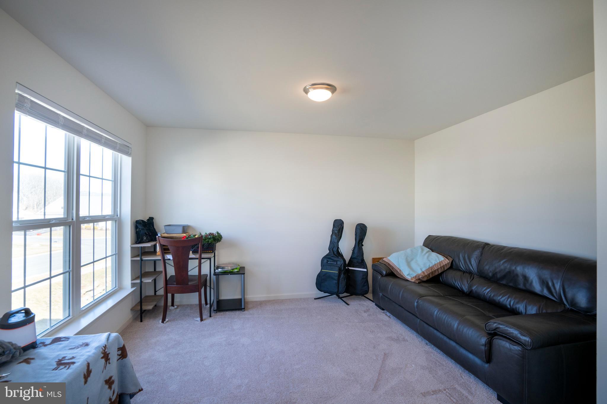 273 Fawn Valley Road State College, PA 16803 - Photo 6 of 47 a living room with furniture and a window