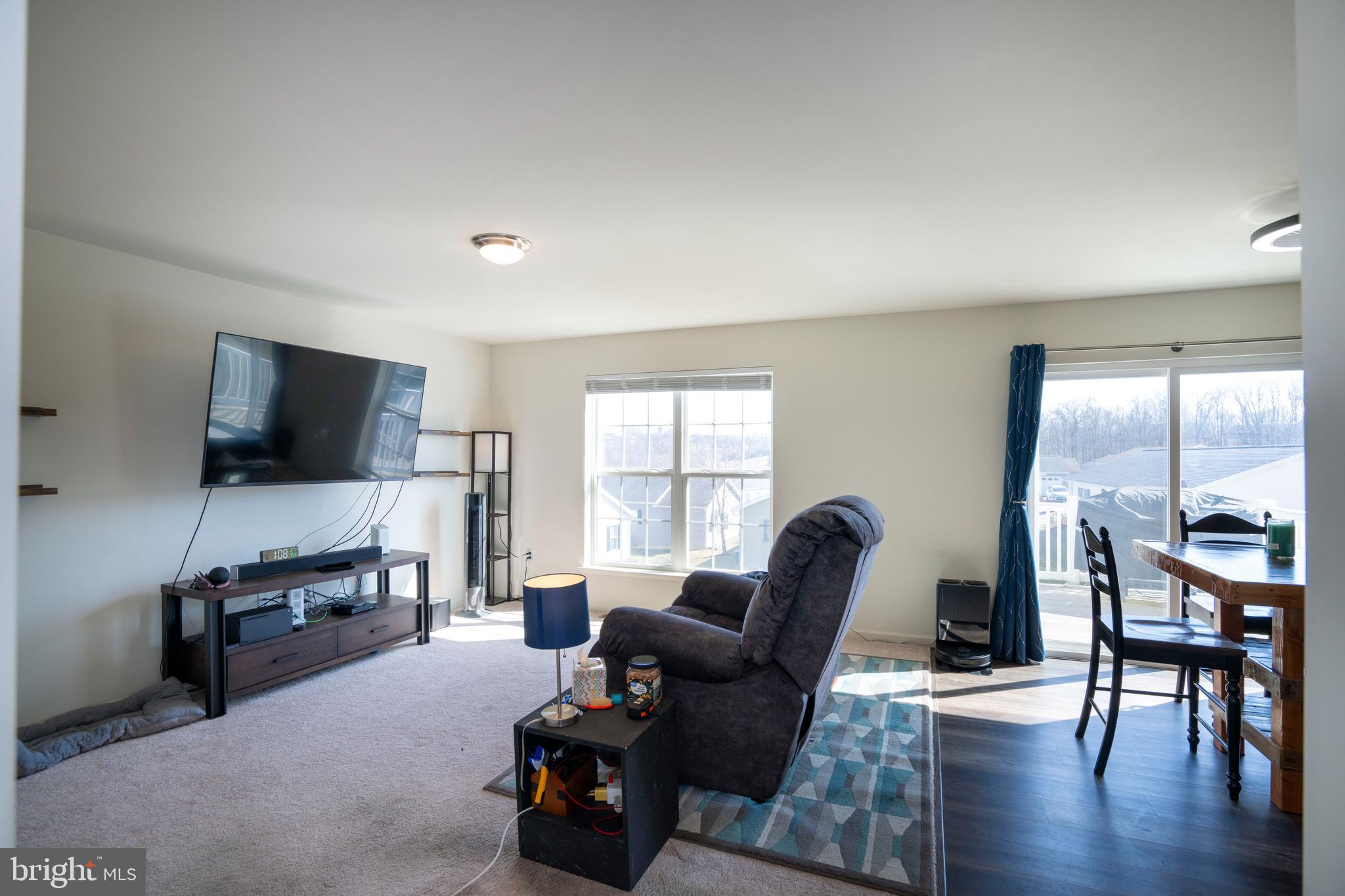 273 Fawn Valley Road State College, PA 16803 - Photo 8 of 47 a living room with furniture and a flat screen tv