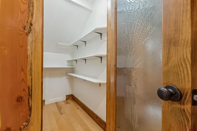 a view of a kitchen island with a sink and a window