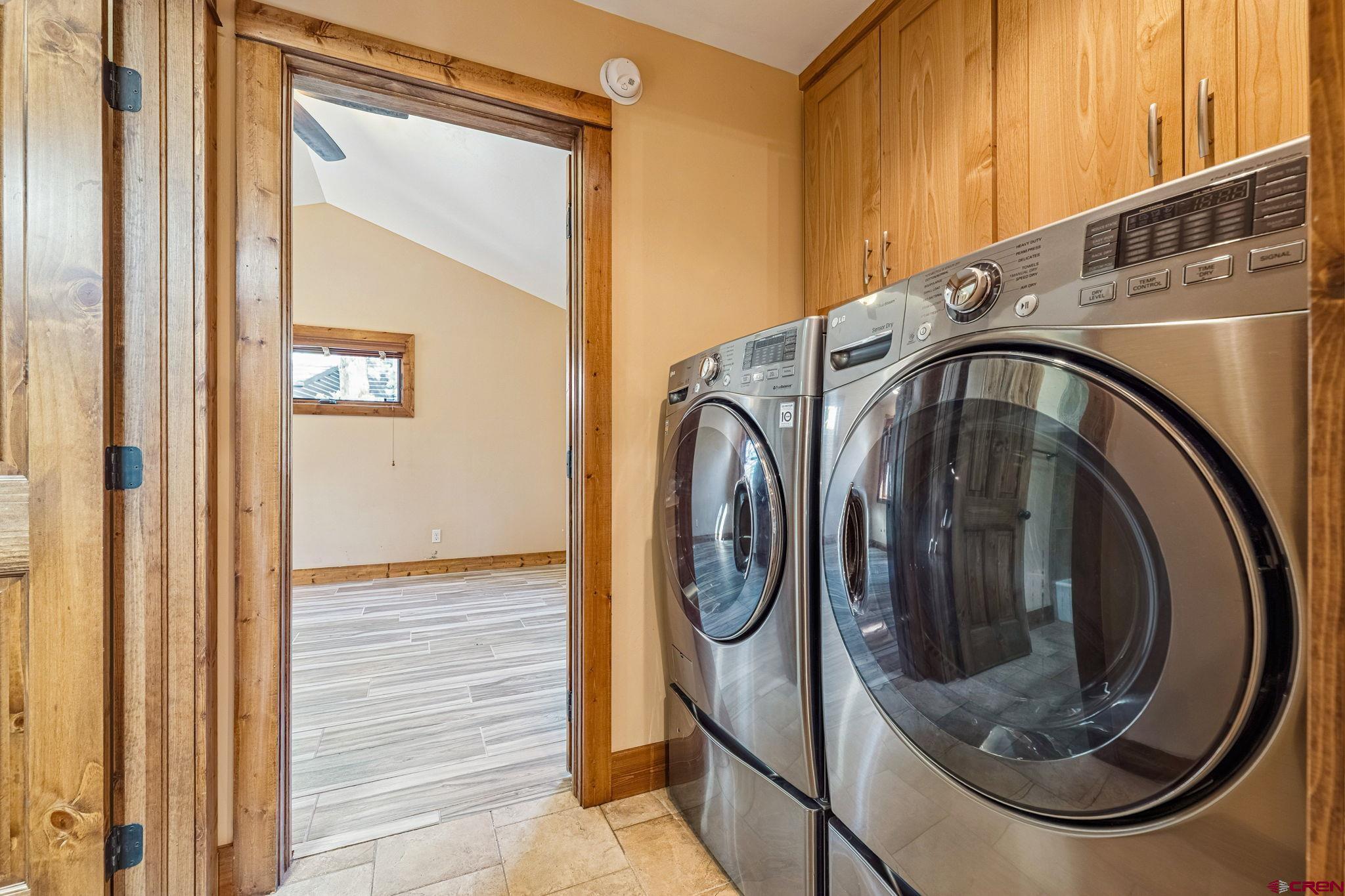 157 Window Lake Trail Durango, CO 81301 - Photo 15 of 39 a utility room with dryer and washer