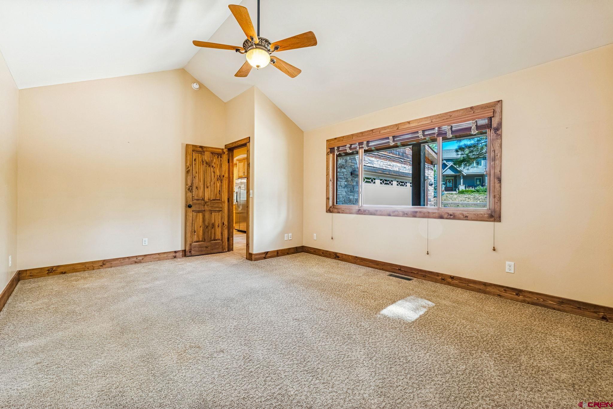 157 Window Lake Trail Durango, CO 81301 - Photo 16 of 39 an empty room with a window and a fan