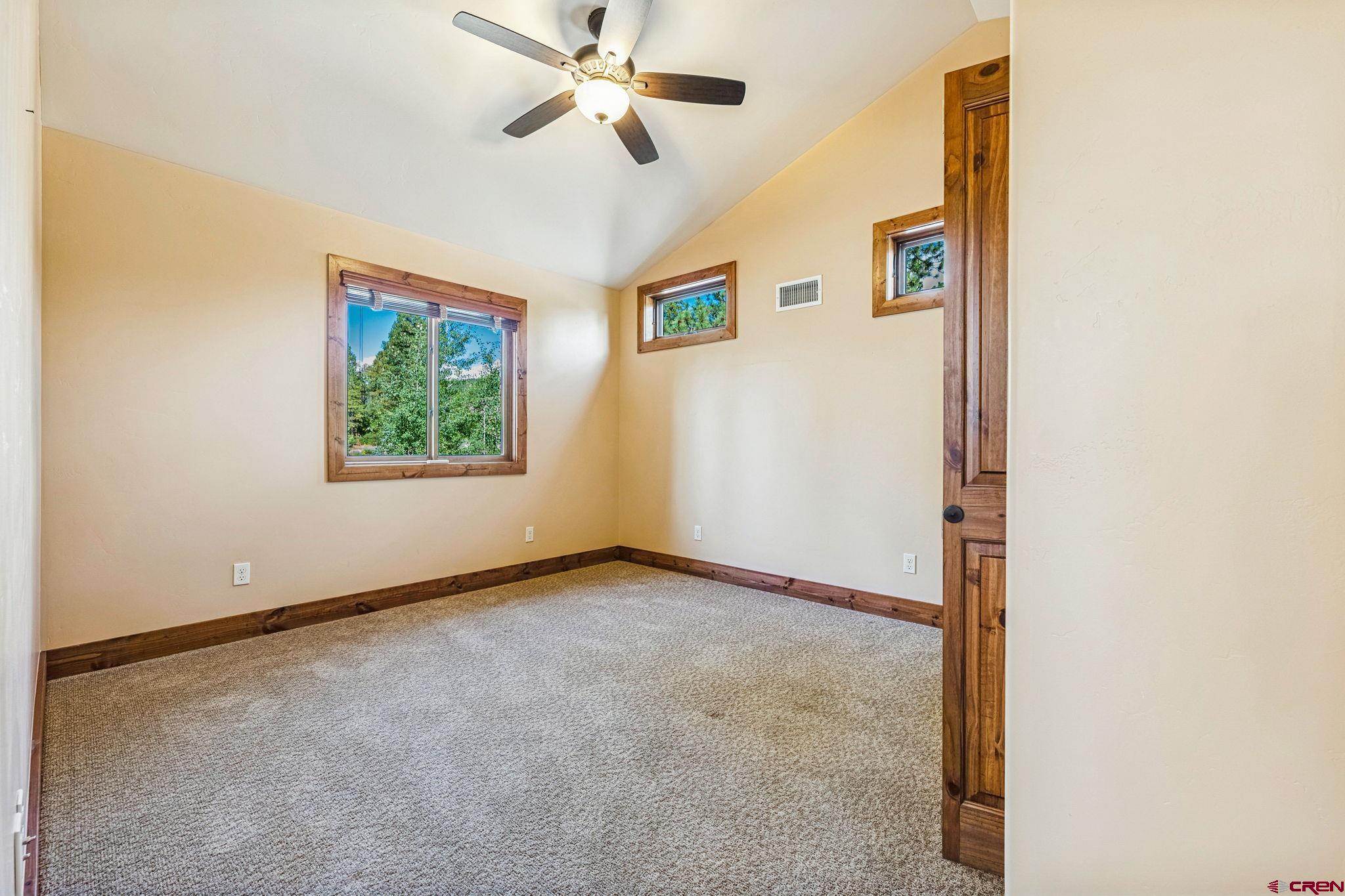 157 Window Lake Trail Durango, CO 81301 - Photo 28 of 39 a view of an empty room with a window