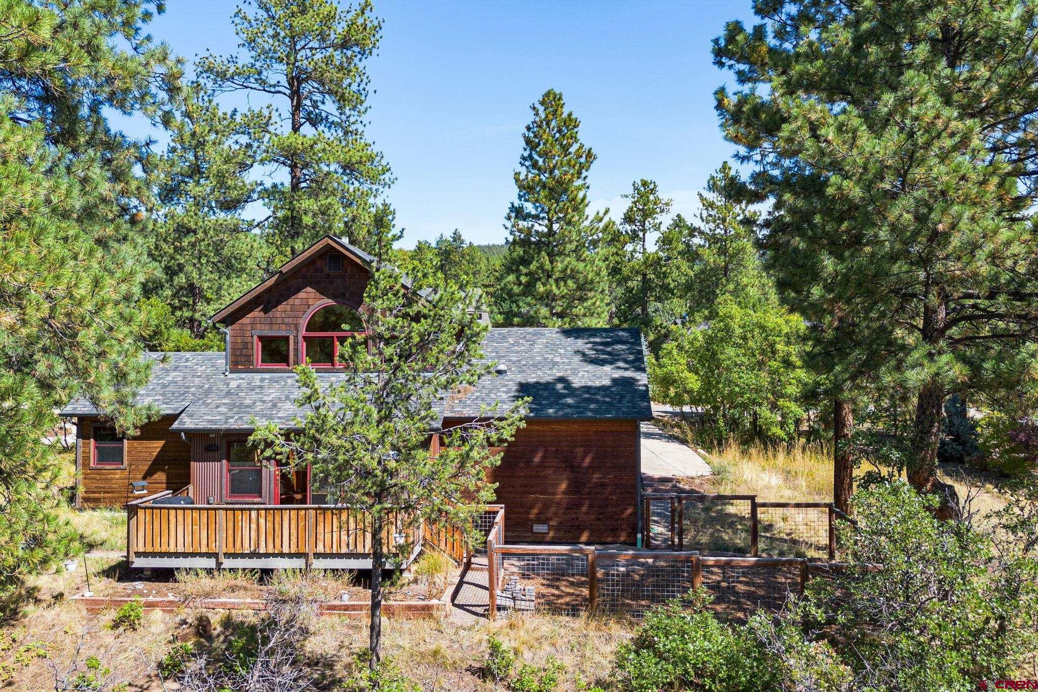 157 Window Lake Trail Durango, CO 81301 - Photo 34 of 39 a front view of a house with a yard