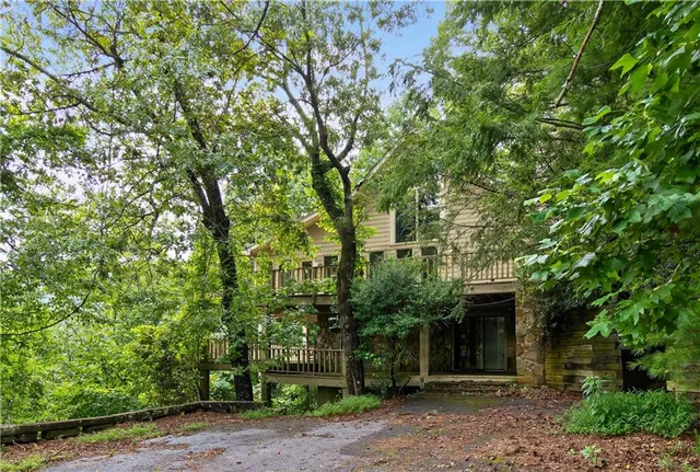 a view of a building with a tree