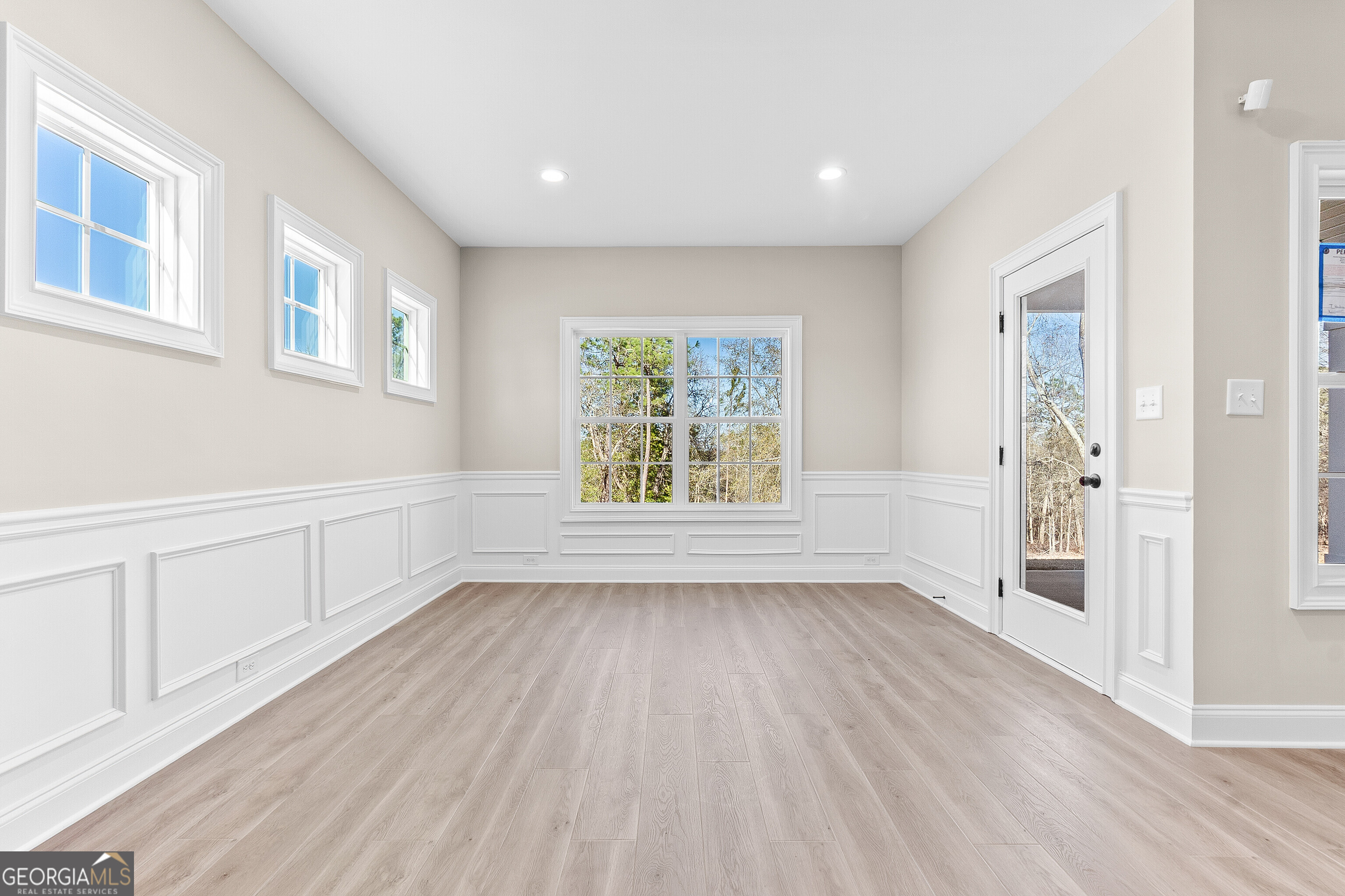 310 Air View Drive Warner Robins, GA 31093 - Photo 29 of 66 a view of an empty room with a window and wooden floor