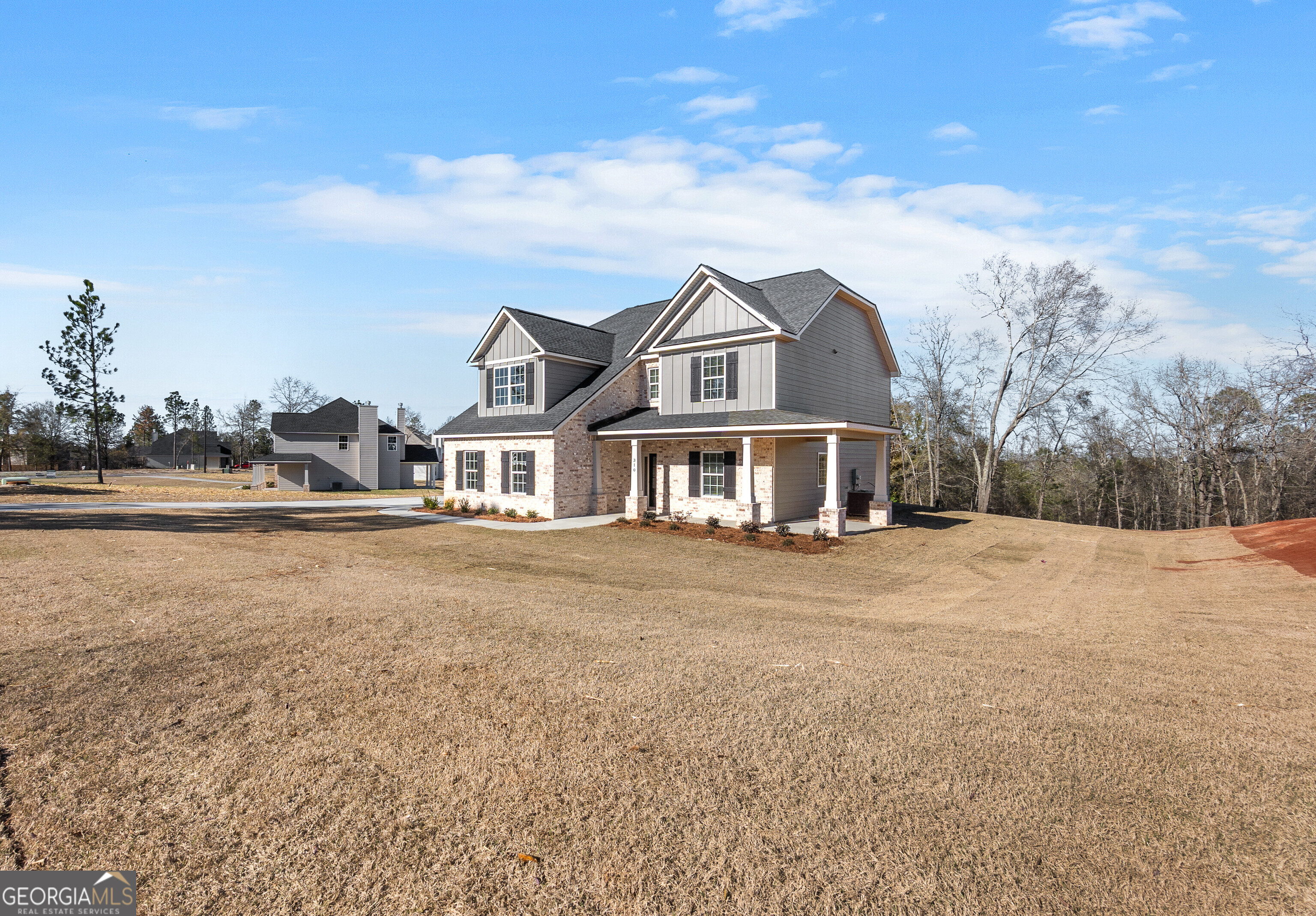 310 Air View Drive Warner Robins, GA 31093 - Photo 4 of 66 a front view of a house with a yard