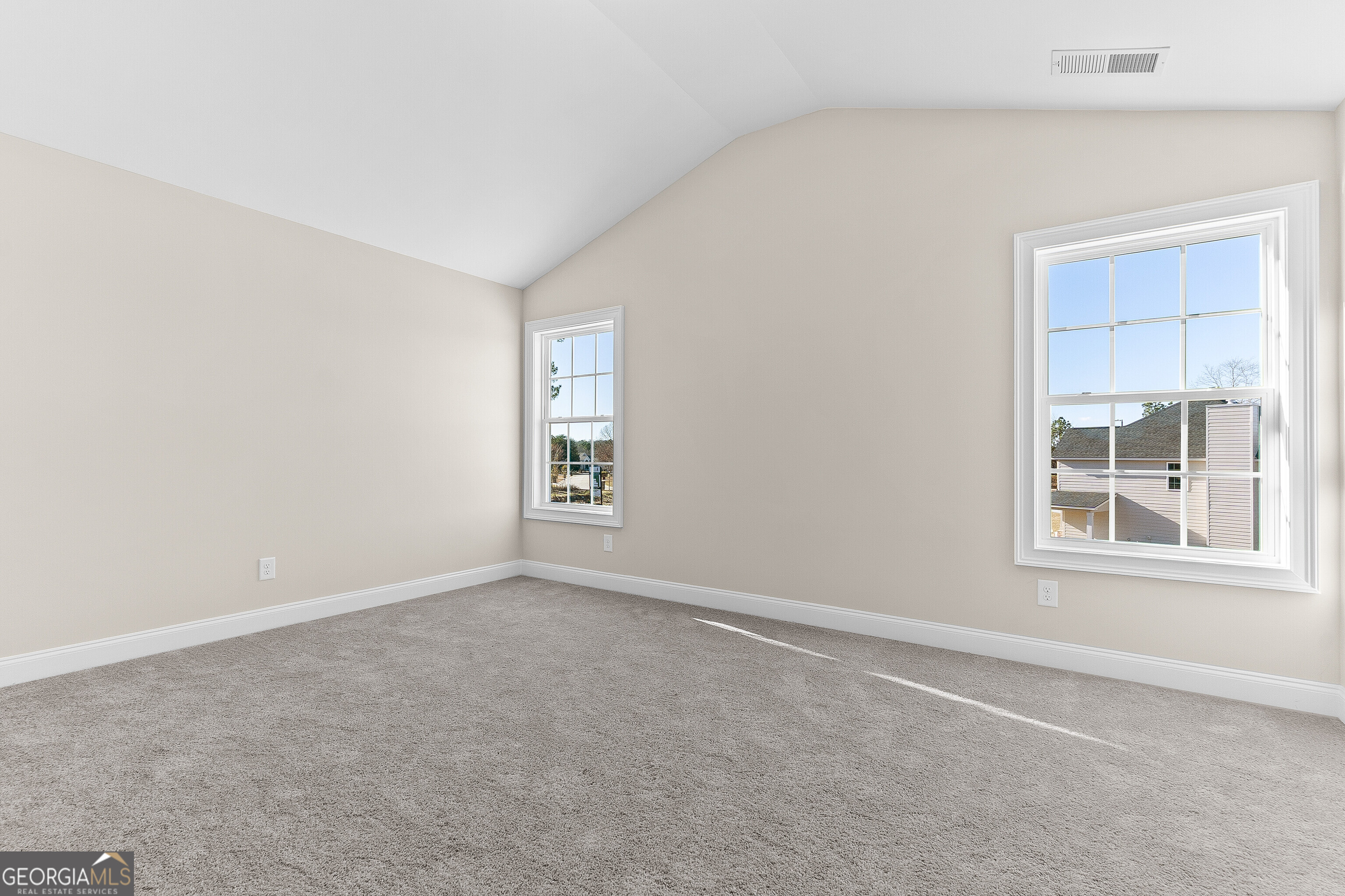 310 Air View Drive Warner Robins, GA 31093 - Photo 47 of 66 an empty room with windows