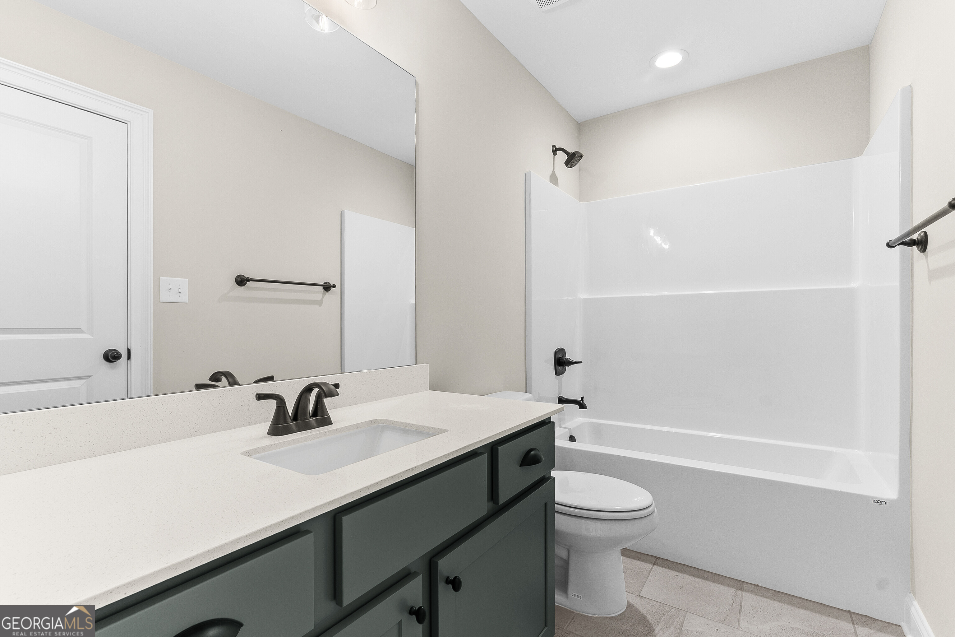 310 Air View Drive Warner Robins, GA 31093 - Photo 49 of 66 a bathroom with a sink a toilet and shower