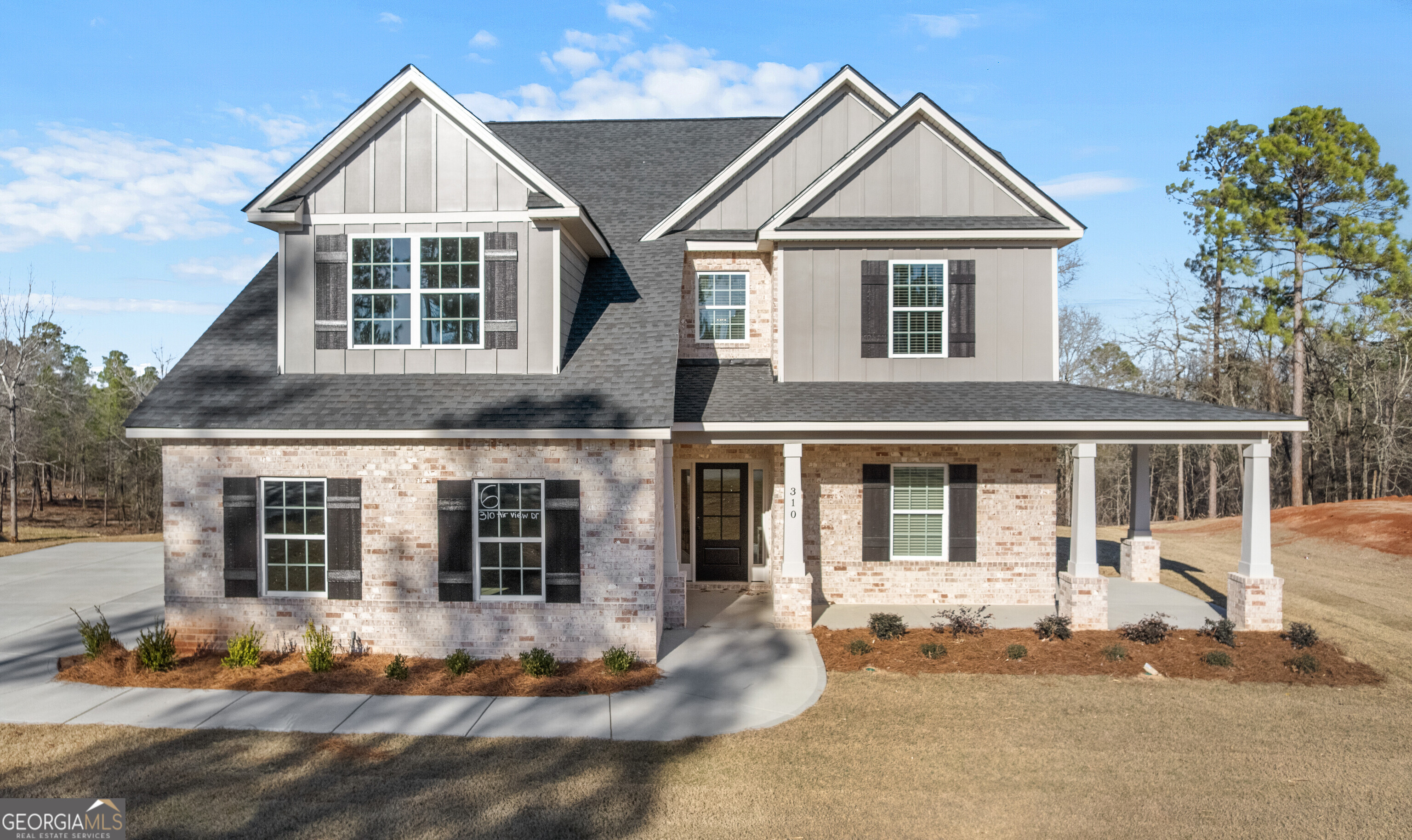 310 Air View Drive Warner Robins, GA 31093 - Photo 5 of 66 front view of a house with a yard
