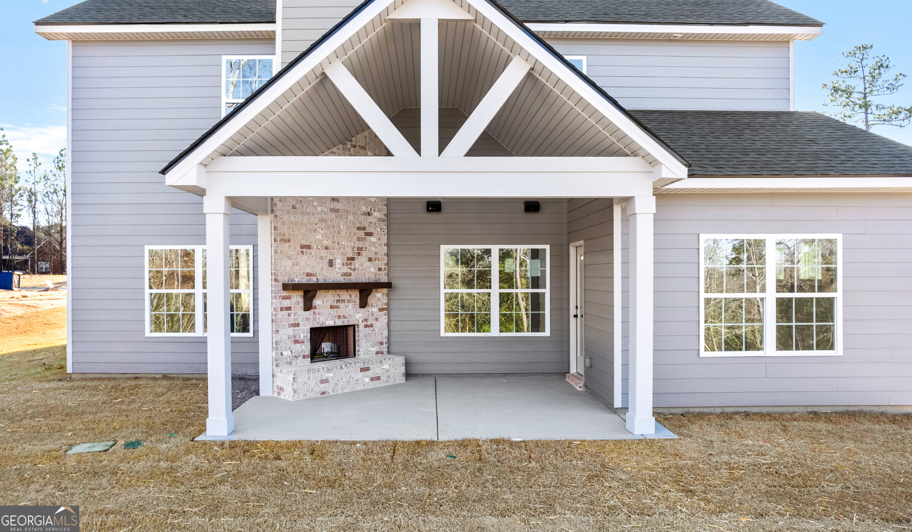 310 Air View Drive Warner Robins, GA 31093 - Photo 60 of 66 a front view of a house with a yard and garage