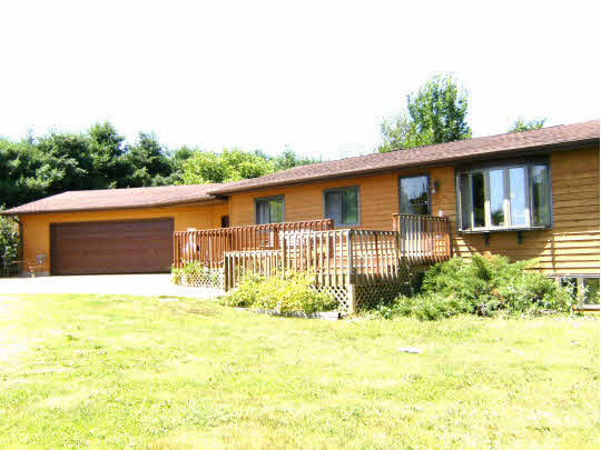 a house view with a garden space
