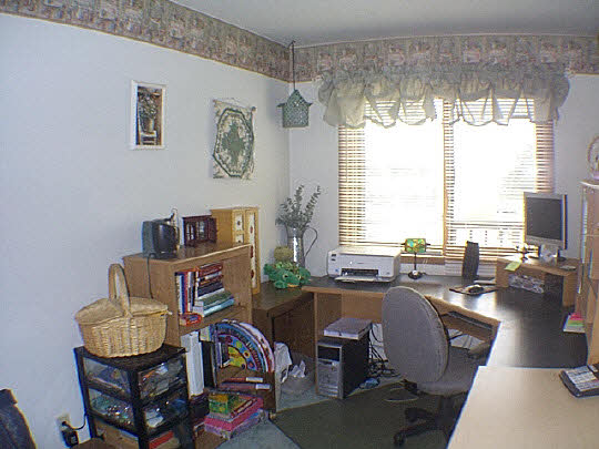 9110 East Weber Road Ridott, IL 61067 - Photo 5 of 12 a living room with furniture and a flat screen tv