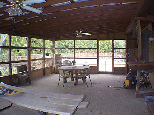 9110 East Weber Road Ridott, IL 61067 - Photo 7 of 12 a dining room with furniture water view and a flat screen tv