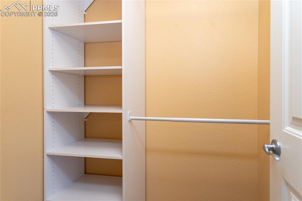 7160 Red Cardinal Loop Colorado Springs, CO 80908 - Photo 28 of 49 a view of walk in closet with clothes